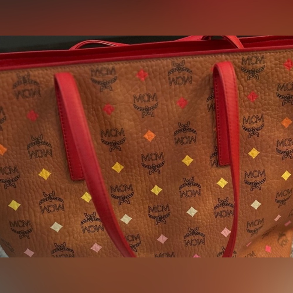 Mcm tote! Authentic. Perfect condition outside and has a stain on the inside.